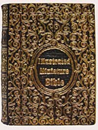 Miniature Bible cover with gilt design and title