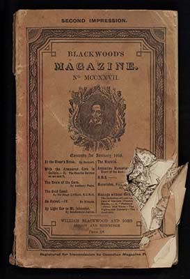 A copy of 'Blackwood's' with a bullet hole