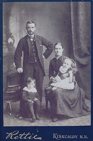 Photo of mother, father and 2 children
