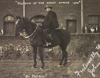 Postcard of John Bird on horse
