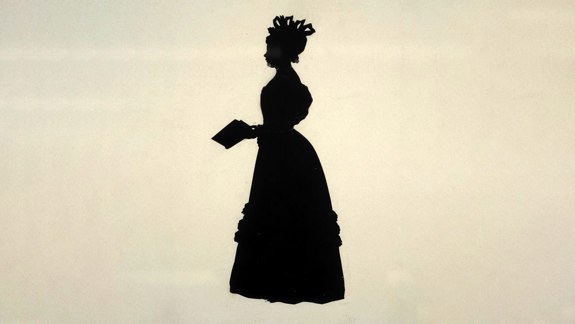Silhouette of a woman in 19th-century attire, wearing a long dress with a fitted bodice and full skirt. The person has an elaborate headpiece and is holding a book.