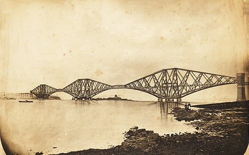 An old photo of the Forth with an illustration of what the artist imagined the Forth Rail Bridge would look like.
