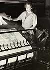 Woman at printing machine