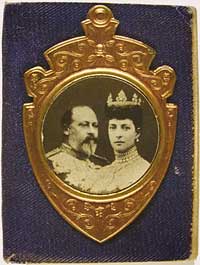 Bible cover with photo of king and queen on it