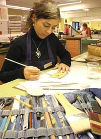 An NLS conservator at work