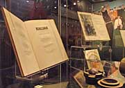 Books on perspex cradles along with other golf exhibits