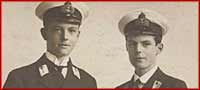 Two young men in naval uniform