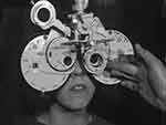 Film still showing an eye test