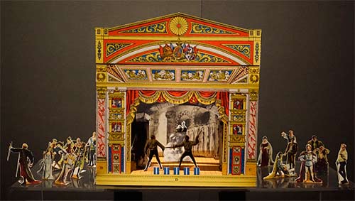 A toy theatre with 'Hamlet' stage set and players
