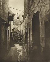 People gathered in a Glasgow close