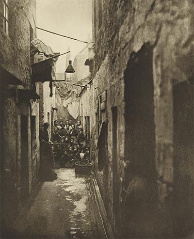 A group of people in an old Glasgow close