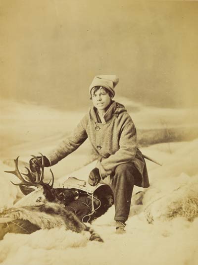 A boy with a moose