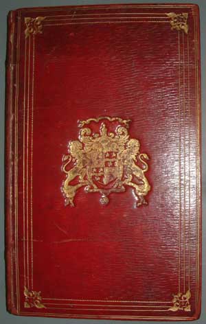 Armorial in gilt on red leather