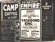 Photo of adverts on side of building