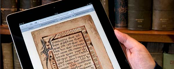 Photo of iPad displaying Gaelic manuscript