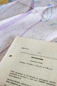 Exam paper in navigation, and a map