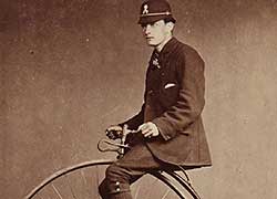 Man on penny farthing