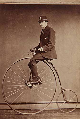 Policeman on penny farthing