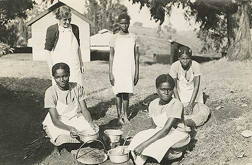 Girls cooking outdoors