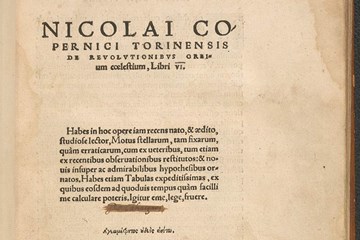 Photo of the title page of 'De Revolutionibus Orbium Coelestium' by Nicolaus Copernicus, 1543. It is written in Latin.