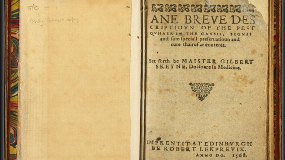 An open book showing the title page of Ane Breve Description.