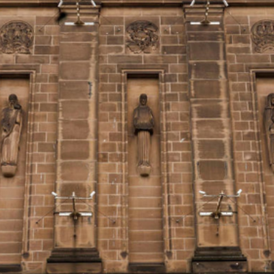 Statues on the front facade of the National Library of Scotland’s George IV Bridge building in Edinburgh.