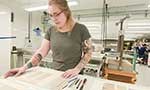 Woman in conservation studio