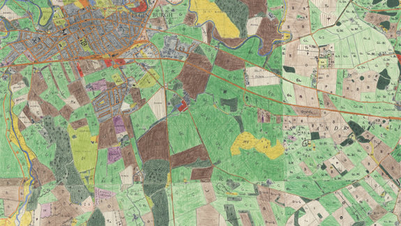 A patchwork of fields, forests, town and other map-based features done in coloured pencil.