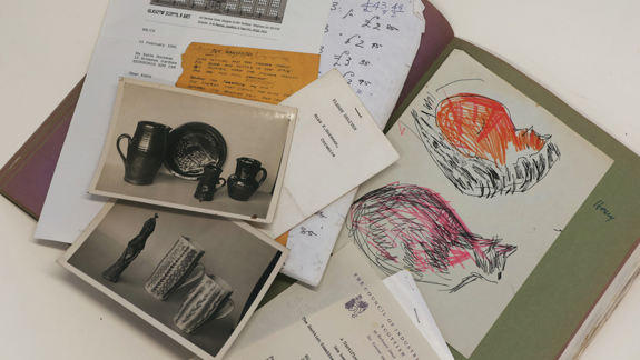 Photos, sketches, and other archival material.