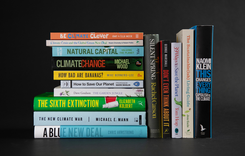 A pile of books about climate change.