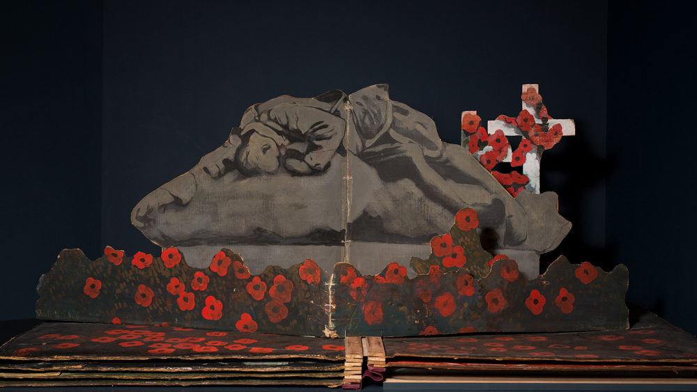 Stage set four covered in red poppies.