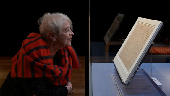 Liz Lochhead looking at the last letter of Mary Queen of Scots in Perth Museum.