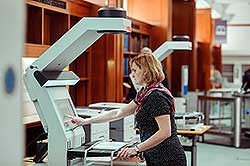 Woman at copying machine