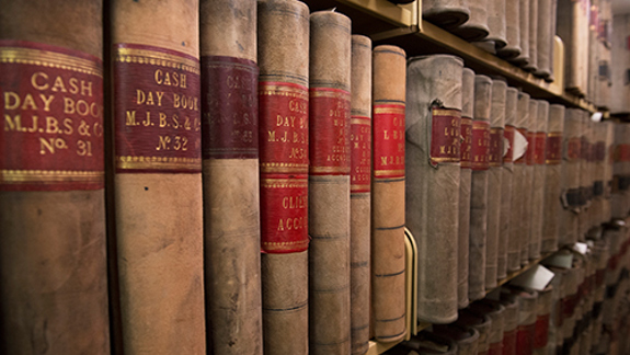 Shelves filled with old books.