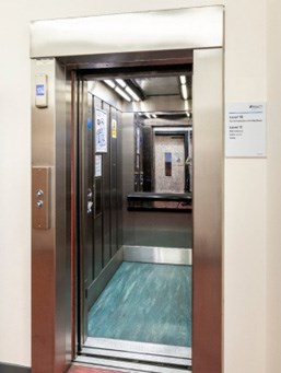Photo of the interior of a passenger lift.