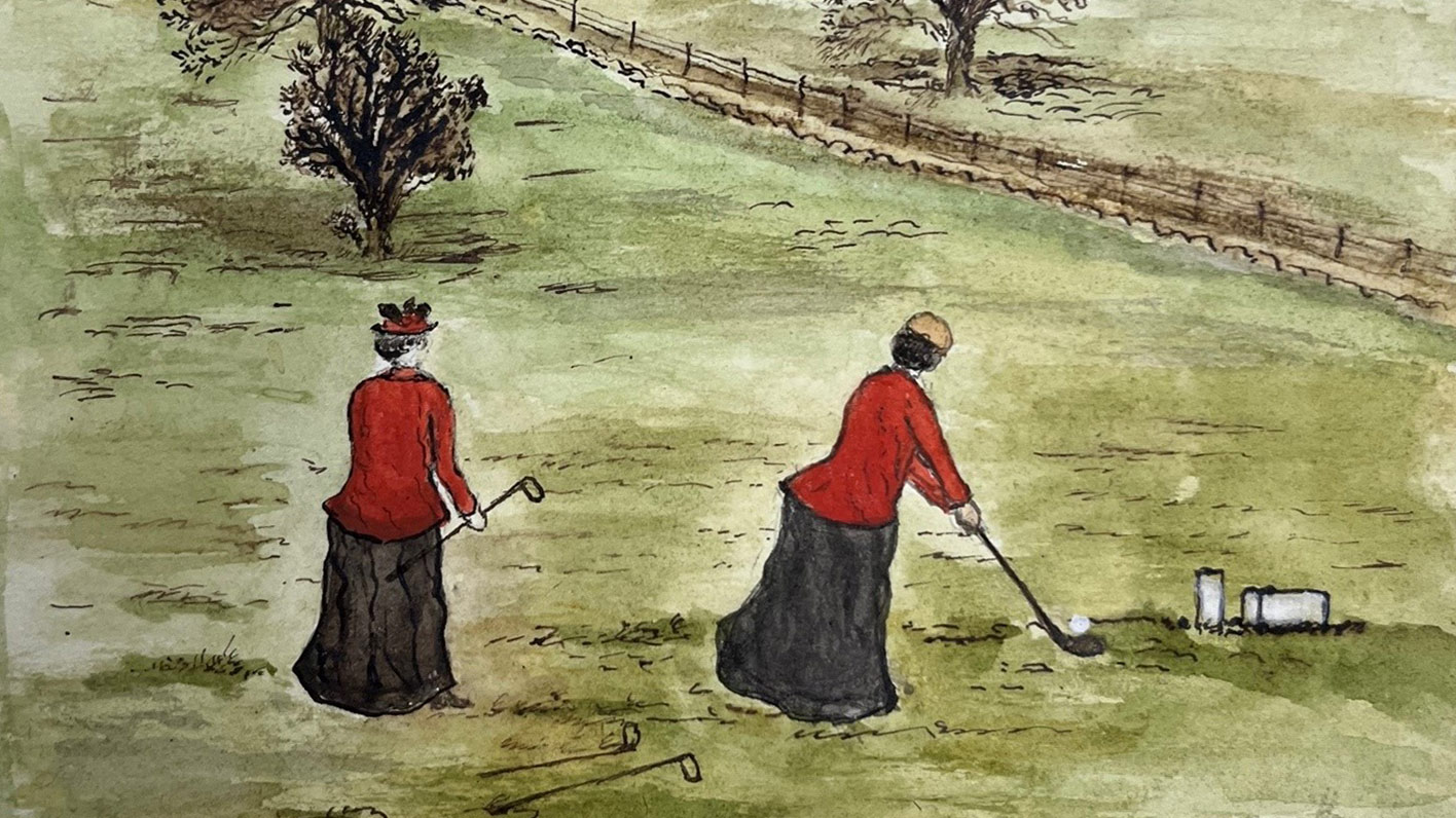 Two women in red jackets and long skirts playing golf on a grassy field with trees and a fence in the background.