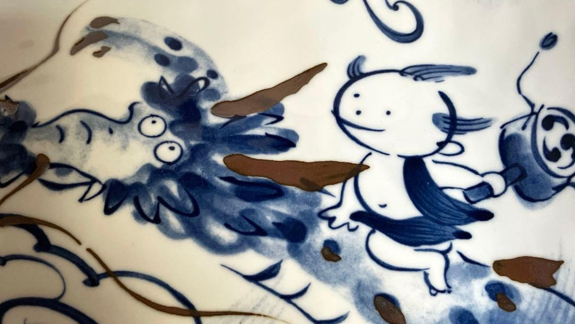 A character riding a dragon.