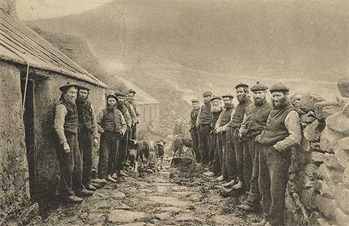 Men standing on St Kilda street