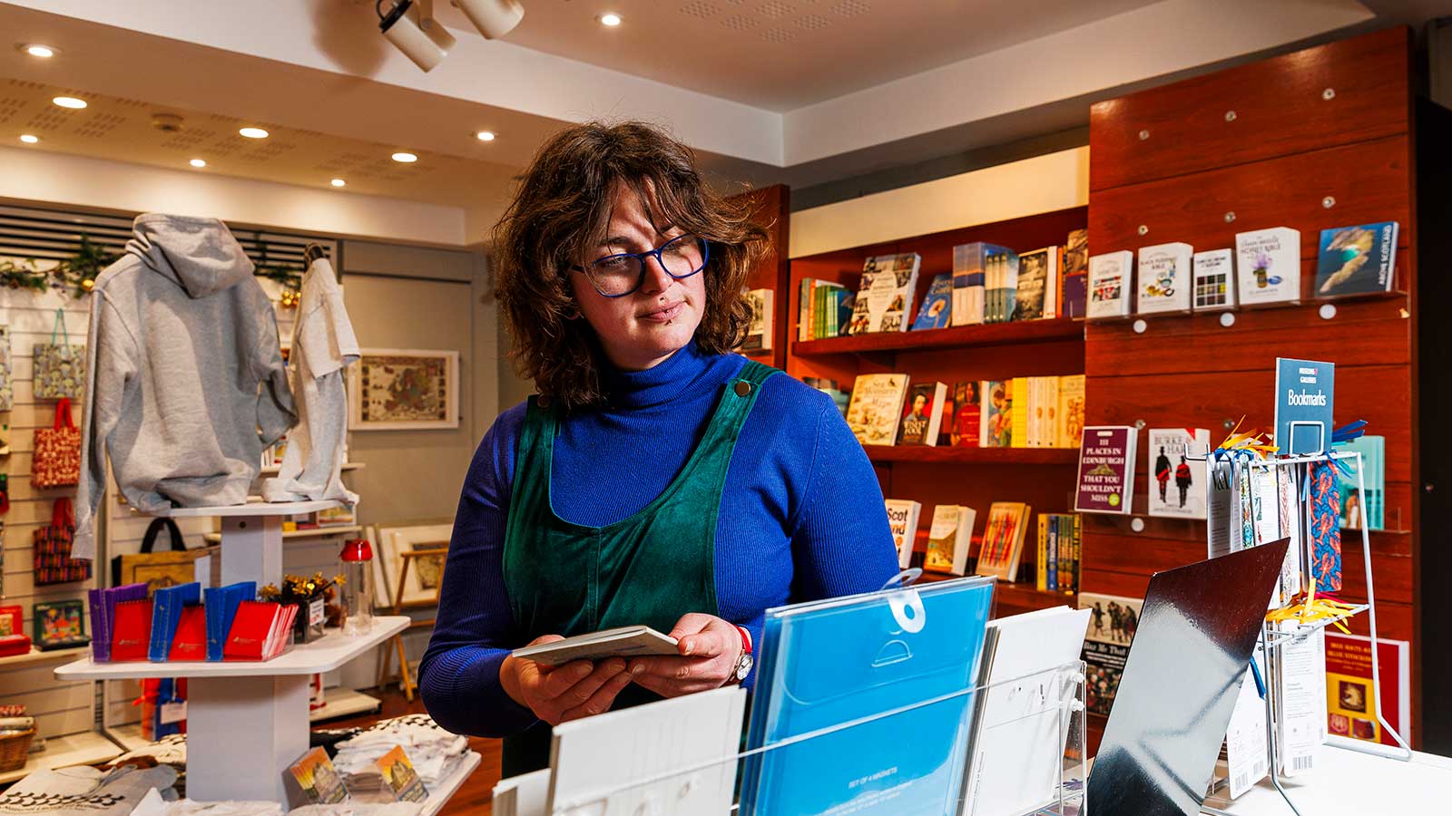 A customer browses the National Library of Scotland shop