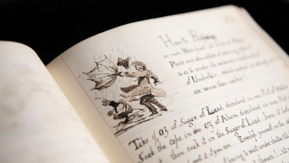 A handwritten recipe with a drawing of someone caught in the rain with their umbrella.