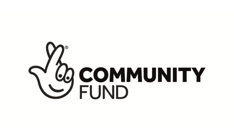 Community fund logo which has a hand crossing its fingers with a smile.