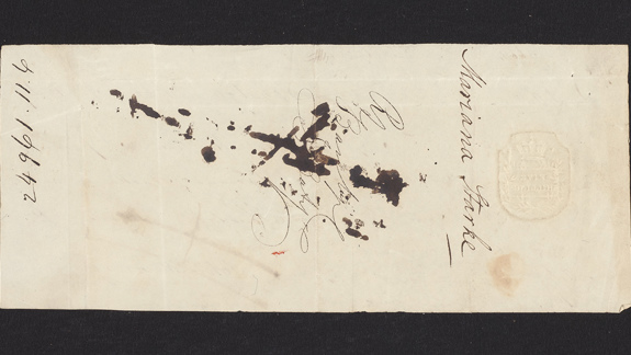 A piece of old yellowed paper with the name "Mariana Starke" written on it in ink. There are ink stains covering other writing on the page.