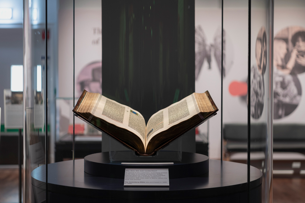 The Gutenberg Bible and on display in a case.