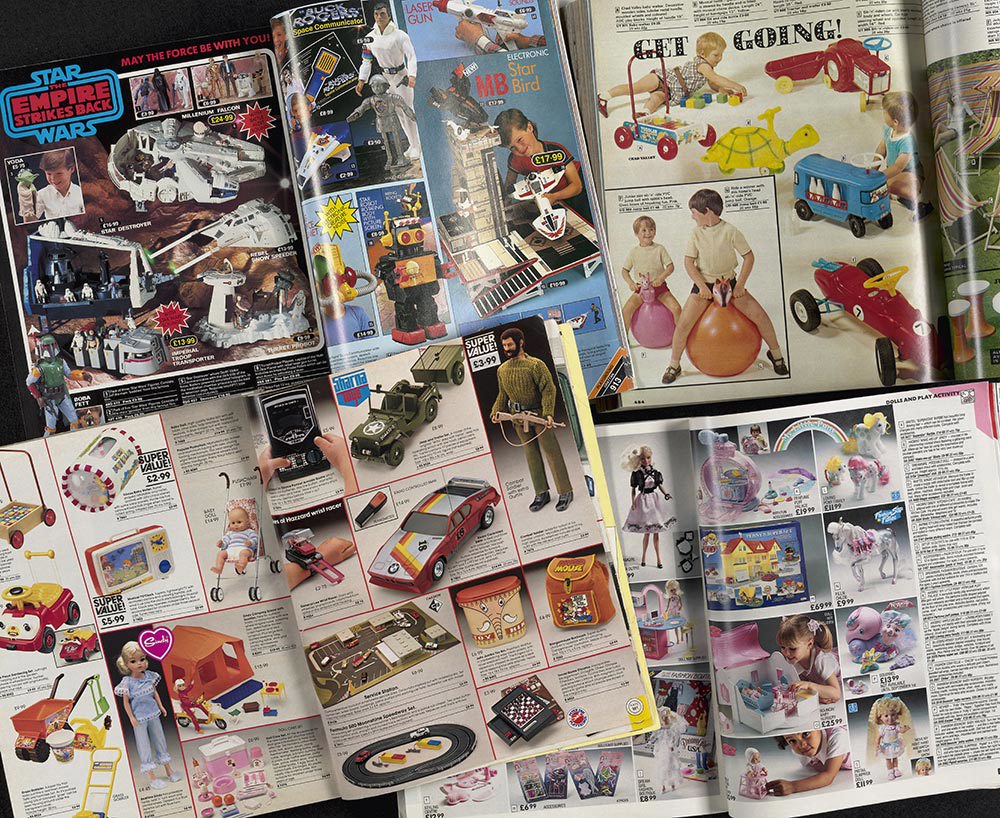 Spread of vintage shopping catalogues showing a range of toys from the 80s and 90s.
