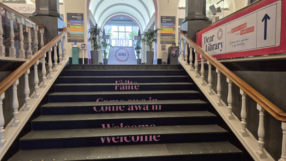 Stairs leading from the main entrance to the ground floor.