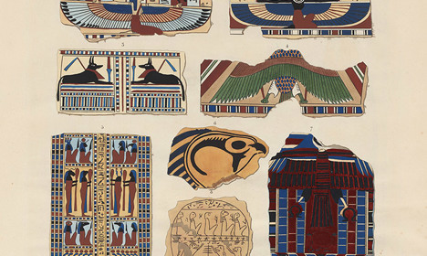 Colourful painted fragments decorated with winged figures, hieroglyphs, geometric patterns and architectural motifs arranged across a page.