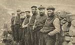 Men standing on St Kilda street