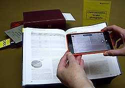 Book being photographed using a smart phone