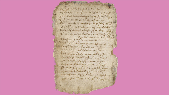 A poem written in Gaelic on a page of old parchment.