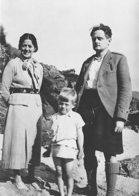 Valda and Christopher Grieve standing with their son Michael.